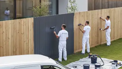Professional fence painting in Savannah, GA by expert house painters protecting wood from coastal weather